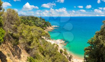 Panorama of Rocks on the coast of Lloret de Mar in a beautiful summer day, Costa Brava, 

Catalonia, Spain