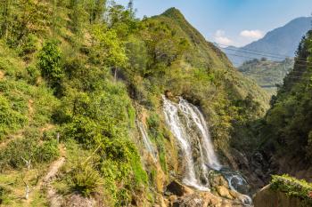 Waterfall in Cat Cat village near Sapa, Lao Cai, Vietnam in a summer day
