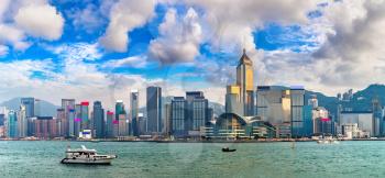Panorama of Victoria Harbour in Hong Kong at summer evening
