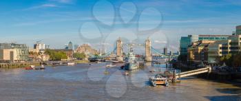 HMS Belfast warship and Tower Bridge in London in a beautiful summer day, England, United Kingdom