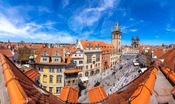 Panoramic aerial view of Old Town square and Clock Tower in Prague in a beautiful summer day, Czech Republic