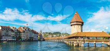 Panorama of Famous Chapel bridge in Lucerne in a beautiful summer day, Switzerland