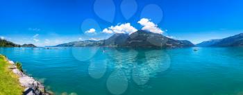 Panorama of Thunersee lake in Switzerland in a beautiful summer day