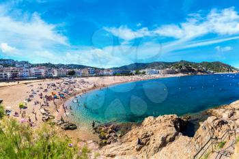 Beach at Tossa de Mar in a beautiful summer day, Costa Brava, Catalonia, Spain