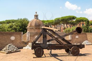 Old roman catapult in Castle Saint Angelo in Rome, Italy in a summer day