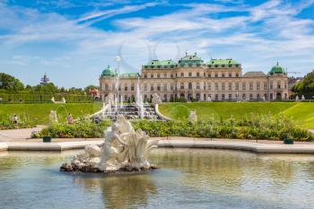 Fountain and Belvedere Palace in Vienna, Austria in a beautiful summer day