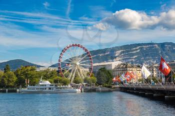 Ferris wheel in Geneva in a beautiful summer day, Switzerland