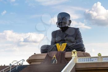 Statue of Luang Phor Tuad at Wat Huai Mongkhon, Hua Hin, Thailand in a summer day