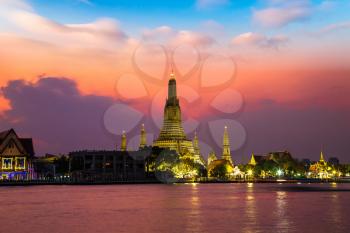Wat Arun Temple at beautiful sunset in Bangkok Thailand.