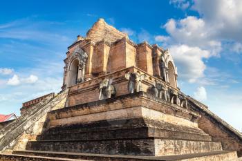 Ancient pagoda at Wat Chedi Luang temple in Chiang Mai, Thailand in a summer day
