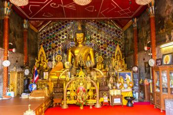 CHIANG MAI, THAILAND - MARCH 29, 2018: Golden pagoda Wat Phra That Doi Suthep in Chiang Mai, Thailand in a summer day