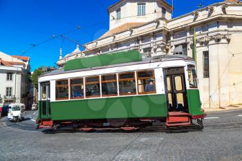 Vintage tram in the city center of Lisbon in a beautiful summer day, Portugal