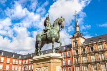 Plaza Mayor and statue of King Philips III in Madrid, Spain in a beautiful summer day