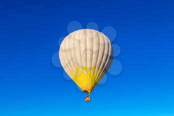 Hot air ballon in the sky in a beautiful summer day