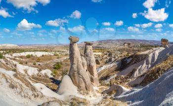 Three Graces (Three Beautifuls) rock hills in Devrent valley in Cappadocia, Nevsehir, Turkey in a beautiful summer day