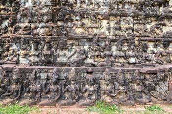 Sculpture on the wall Terrace of Elephants temple is Khmer ancient temple in complex Angkor Wat in Siem Reap, Cambodia