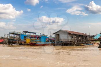Chong Khneas floating village near Siem Reap, Cambodia in a summer day