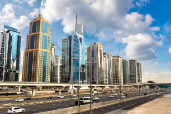 Sheikh Zayed Road in Dubai in a summer day, United Arab Emirates