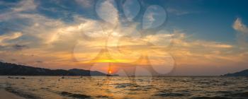 Panorama of Patong beach and Andaman sea on Phuket in Thailand during sunset