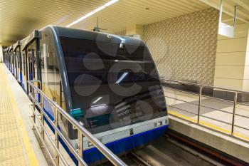 Modern tunnel funicular train in Istanbul in a summer day