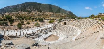 Panorama of Amphitheater (Coliseum) in ancient city Ephesus, Turkey in a beautiful summer day