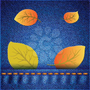 autumn leaves on realistic blue jeans texture for your design