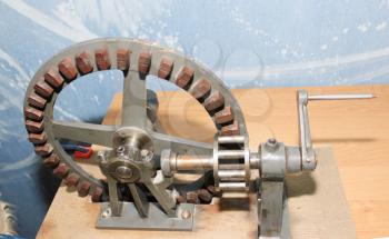 Metal gears for experiments. Gears set contacts. Interlocking industrial metal gears.