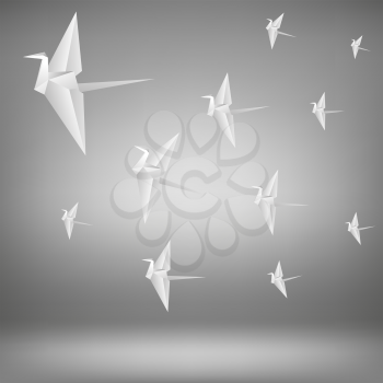 A Flock of White Paper Birds on Grey Background