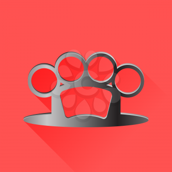 Metal Knuckle Isolated on Red Background. Long Shadow.