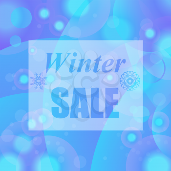 Winter Sale Text on Blue Blurred Background