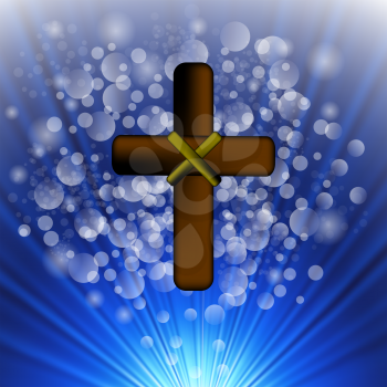 Simple Brown Wooden Cross on Blue Blurred Background