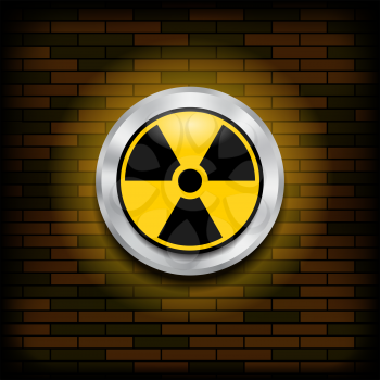 Ionizing Radiation Sign. Radioactive Contamination Symbol. Warning Danger Hazard on Orange Brick Wall.