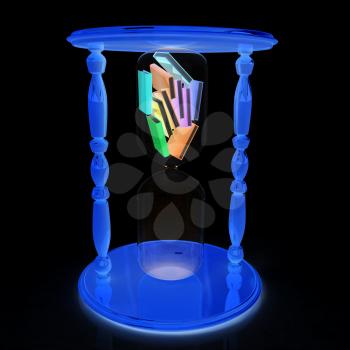 3d hourglass with the books inside on a black background