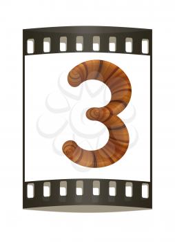 Wooden number 3- three on a white background. The film strip