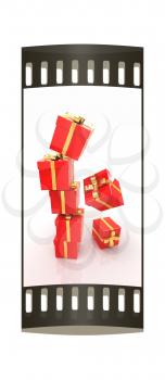 Bright christmas gifts on a white background. The film strip