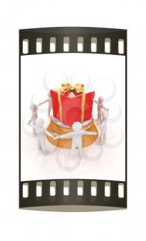 3d man around red gift with gold ribbon on a white background. The film strip