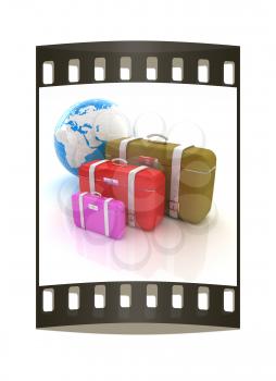 Traveler's suitcases. Family travel concept. The film strip