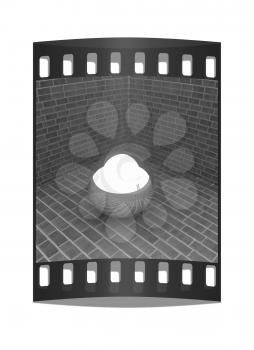 The chrome ball in the corner of a brick. The film strip