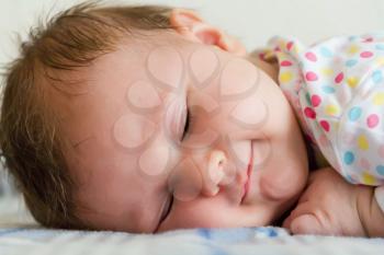 Image of beautiful cute sleeping newborn girl