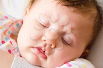 Photo of beautiful cute sleeping infant girl