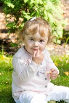 Photo of beautiful cute thinking infant girl