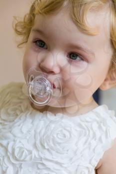 Image of cute baby girl with tear