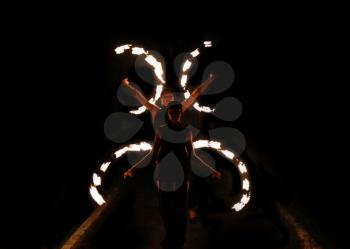 Beautiful dance with fire at night
