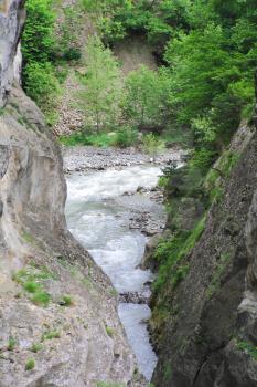 Image of waterfall in Caucasus mountains in summer