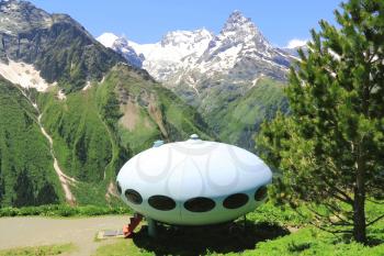 Scenery with Ufo in Caucasus mountains in Russia