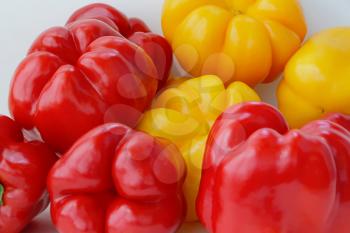 Image of red and yellow raw pepper