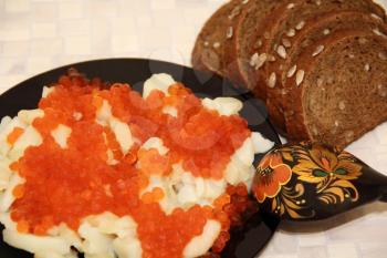 Still life with Russian national food caviar and potatoes