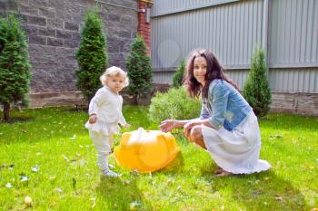 Photo of smiling mother and baby in summer