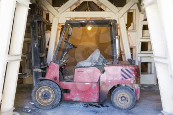 Photo of industrial old desolate lift truck