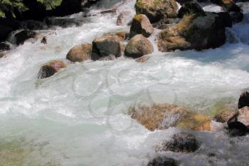 Photo of river in Caucasus mountains in summer